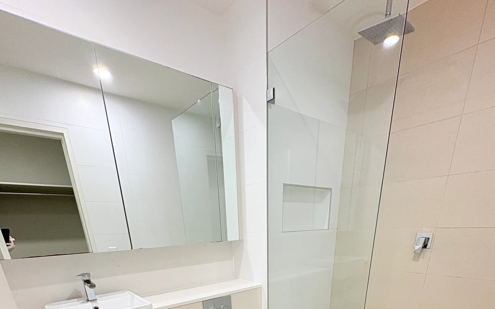 Clean bathroom glass, tiles and fittings after OMAKASE deep cleaning